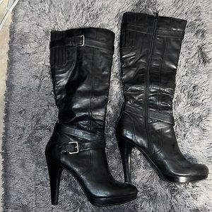 Tall black pleather boots
